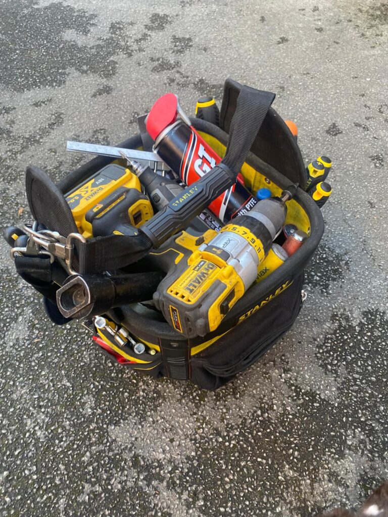 Image of a well-stocked locksmith's tool bag